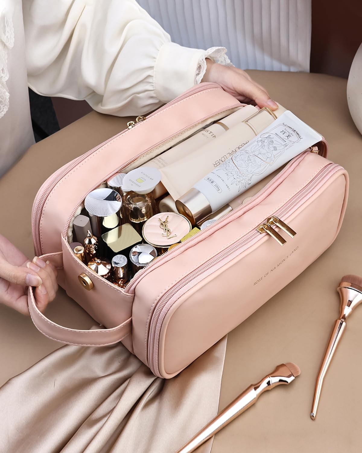 Pink travel makeup bag with wide opening – view 1